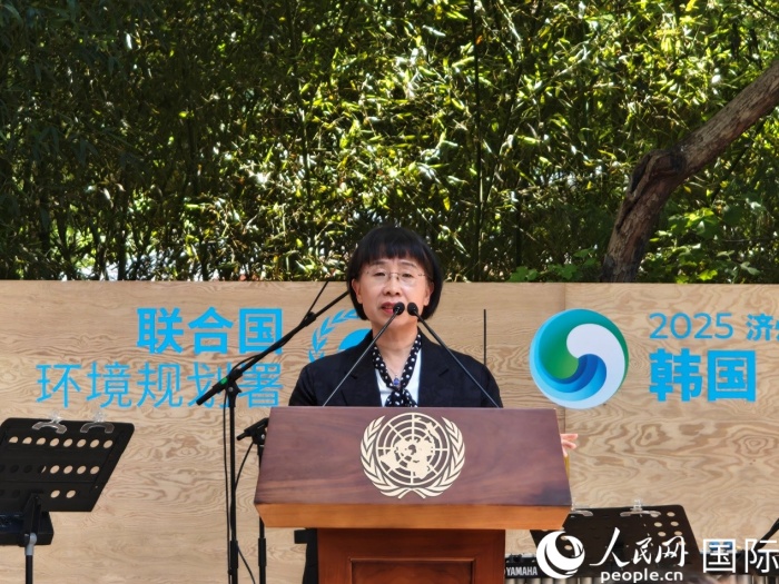 周國(guó)梅致辭。人民網(wǎng)記者 李明攝